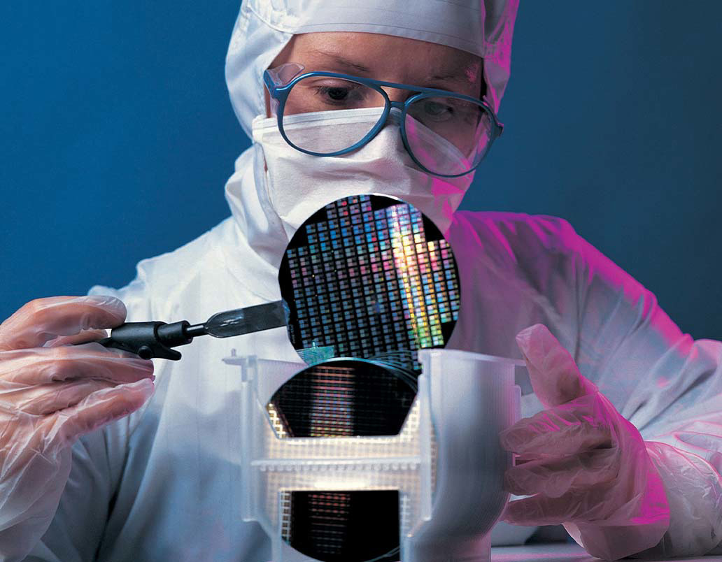 Man inspecting wafer